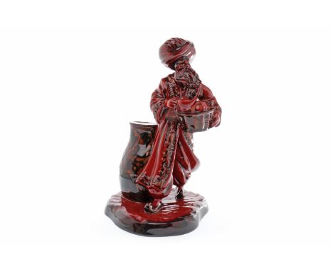 ROYAL DOULTON FLAMBE FIGURE OF 'THE LAMP SELLER'HN 3278, circa 1990-95, modelled by Robert Tabbenor, printed marks and gilt n