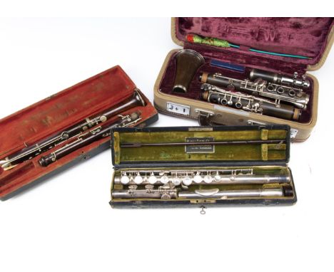 Flute / Clarinet / Oboe, a Rudall Carte and Co Flute in Case with cleaner (stamped 1912) - Case rather worn but with key, Flu