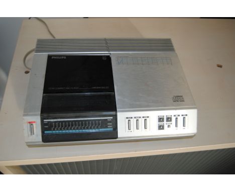Philips CD 101 Player, Philips CD 101 Compact Disc Player (laser beam read out) appears intact and good condition (needs a cl
