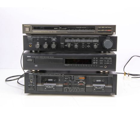 Yamaha Separates, a Yamaha Stereo Sound Control C 45 Preamplifier, a Yamaha CD Player CDX 470S with Instruction Book and remo