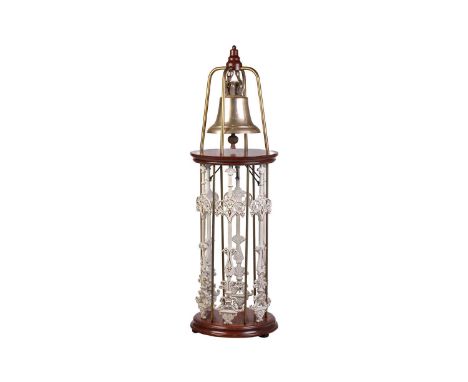 A large and impressive bell stand, housing a heavy cast bell metal marine (?) bell, 20th century, suspended from a tubular br