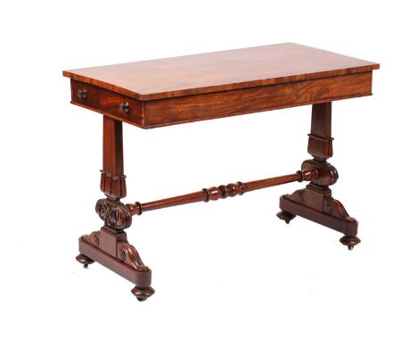 An early Victorian mahogany rectangular side table with unusually configured end frieze drawers on shaped end stile supports 