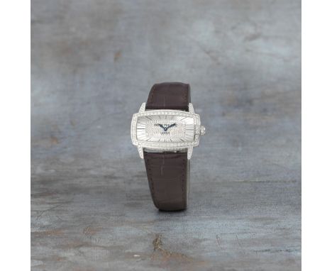Patek Philippe. A lady's 18K white gold and diamond set quartz rectangular wristwatchModel: Gondolo GemmaReference: 4982Date: