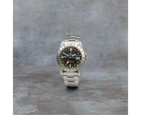 Rolex. A stainless steel automatic calendar bracelet watch with dual time zone from the family of the original ownerModel: Ex