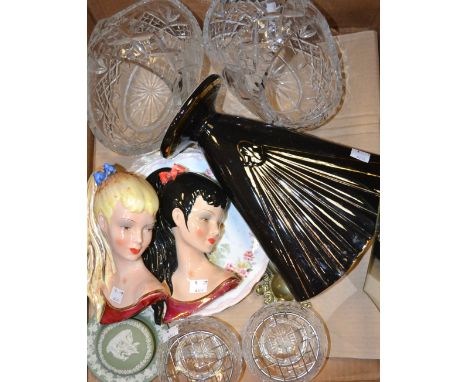 A novelty wall mirror, as a Scimitar; a pair of 1950's style wall pockets, as young girls in profile; a pair of cut glass fru