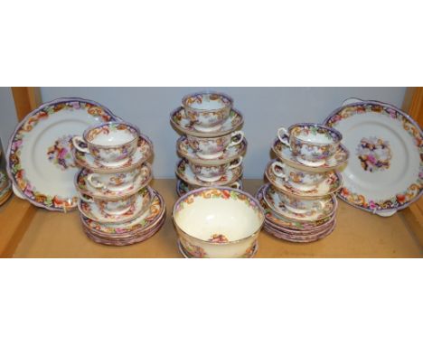 A Victorian transfer printed tea set, comprising eight cups, eight saucers, twelve tea plates, a slop bowl, a pair of bread a