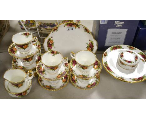 A Royal Albert Old Country Roses six setting tea set, comprising comport, sandwich plate, cups, saucers, sideplates, milk and