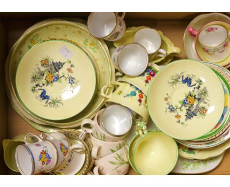 A set of six Art Deco Longton coffee cans and saucers; a Royal Staffordshire Art Deco milk jug; other cups and saucers; Crown