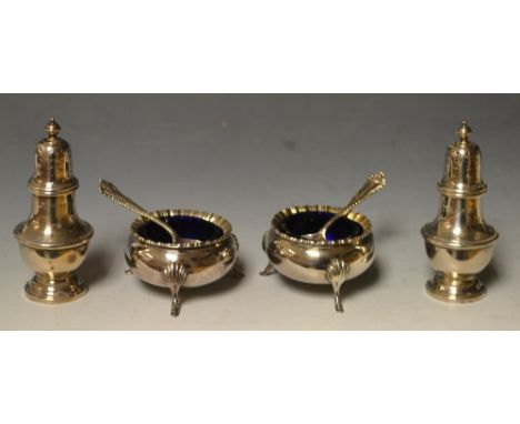 A silver salt and pepper set, of baluster form, circular bases, marked Adie Brothers Ltd, Birmingham 1955; a pair of silver s