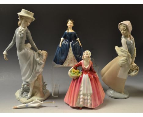 A Lladro figure of a girl; another Nao; two Doulton figures, Debbie HN2385 (4)