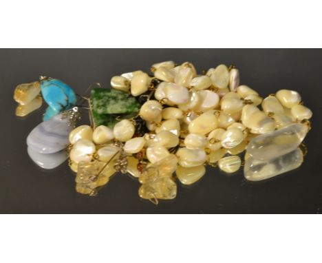 Jewellery - a turquoise pendant; a jade tablet pendant; a mother of pearl bead necklace; etc.; quantity