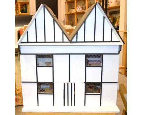 Toys and Juvenalia - a wooden front opening dolls house, with wooden accessories including furniture, books, ceramic tea serv