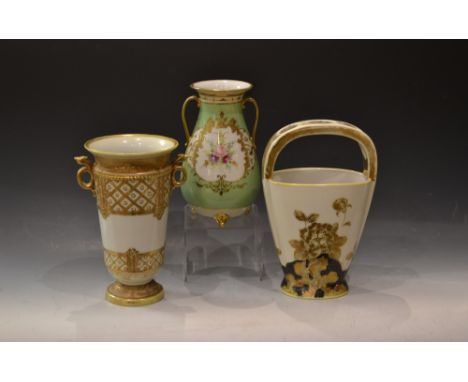 A Japanese Noritake basket vase, decorated with gilt and flowers; a twin handled vase; another (3)