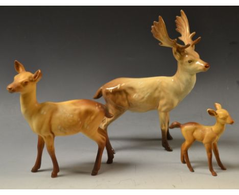 A Beswick reindeer,deer and foal; ceramic animal models; etc.