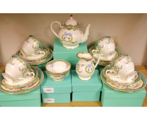 A Royal collection four setting tea service comprising teapot, milk jug, sugar bowl, cups, saucers etc. 