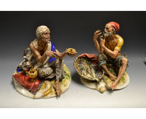 A Capodimonte figure of a Moroccan street lamp vendor, Crown N factory mark; another, fish seller (2)