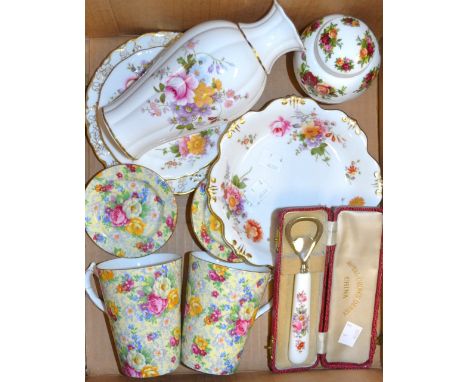 A pair of Royal Albert floral printed chintz chocolate cups and saucers/covers; a Royal Crown Derby Posie pattern vase, bottl