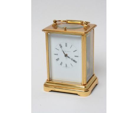 An oxidised brass carriage clock with strike repeat movement maker Mathew Norman