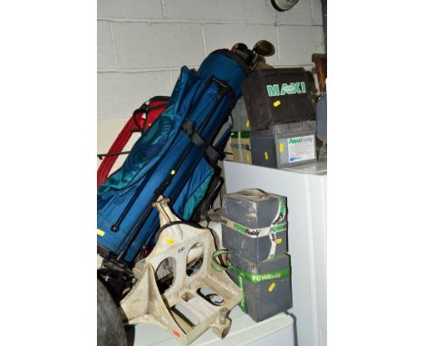 A COLLECTION OF GOLF EQUIPMENT to include gold bag with club, Taylor made, Ping and an electric golf caddy with a quantity of
