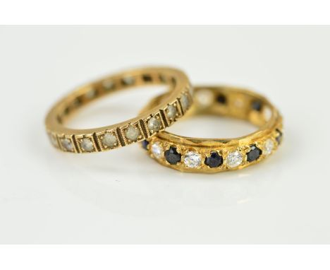 TWO ETERNITY RINGS, the first set with colourless circular pastes, stamped 9ct, ring size P, the second set with circular sap