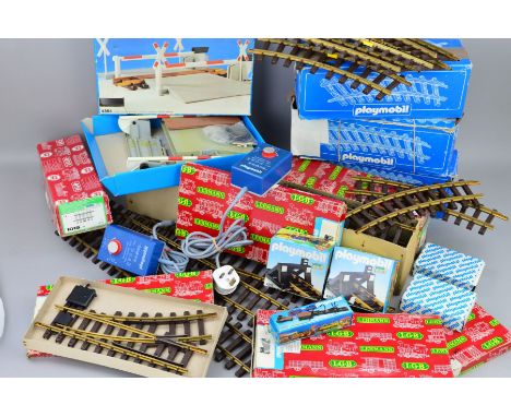 A QUANTITY OF BOXED AND UNBOXED PLAYMOBIL AND LGB G SCALE TRACK AND ACCESSORIES, straight and curved track, points, level cro