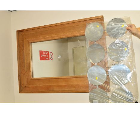 A LIGHT OAK WALL MIRROR, 111cm x 81cm, together with another wall mirror (2)