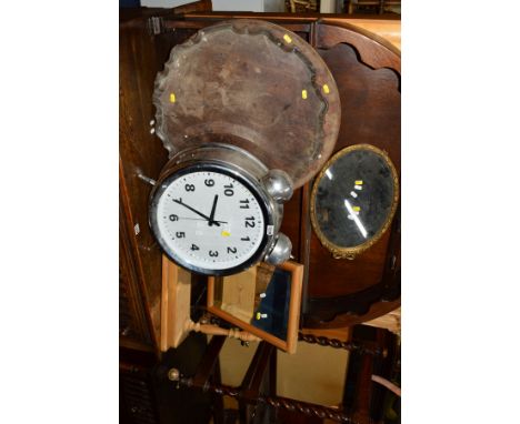 A LARGE MODERN CIRCULAR CLOCK, a pine swing mirror, two mahogany dish  table TOPS (no bases) and a mirror (5)