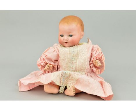 AN ARMAND MARSEILLE BISQUE HEAD BABY DOLL, nape of neck marked 'A.M. Germany 351./3 1/2.K' sleeping eyes, paint loss to lids,