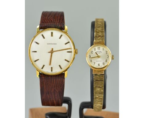 TWO WRISTWATCHES to include a lady's 9ct gold Rotary watch, the circular face with Arabic numerals to the textured bark effec