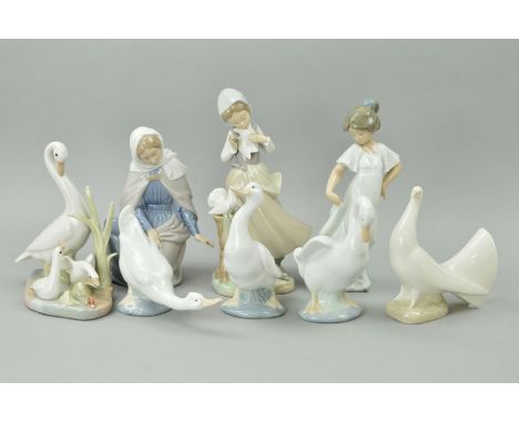 A LLADRO FIGURE, 'Girl with Pigeons', No4915, designed by Salvador Debon, height 22cm, together with six Nao figures (Virgin 