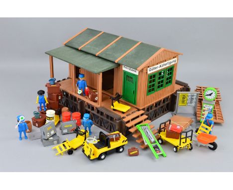 AN UNBOXED PLAYMOBIL G SCALE RAILWAY GOODS DEPOT, with a quantity of accessories, appears largely complete