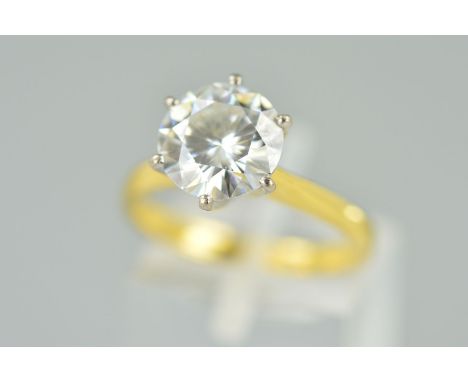 AN 18CT GOLD MOISSANITE SINGLE STONE RING, the circular moissanite within a six claw setting, diameter of moissanite 9.5mm, 1