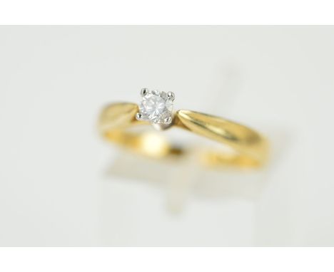 A 9CT GOLD SINGLE STONE DIAMOND RING, the brilliant cut diamond within a four claw setting to the tapered shoulders, estimate