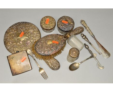 A BOX OF SILVER BACKED DRESSING TABLE ITEMS, including silver topped glass jars and bottles largely in poor condition, togeth