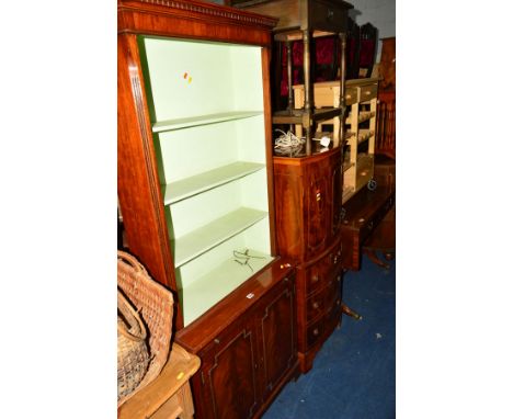 A REPRODUCTION MAHOGANY OPEN BOOKCASE, with a painted interior above a double cupboard door base and brushing slide, width 76