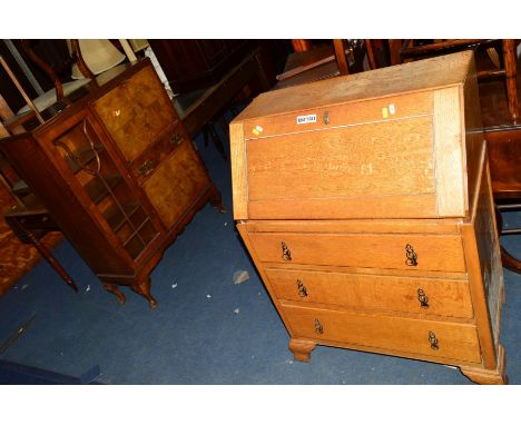 A LIGHT OAK FALL FRONT BUREAU above three drawers and an Edwardian walnut side by side bureau bookcase with a single drawer (