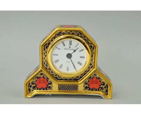 A ROYAL CROWN DERBY OLD IMARI QUARTZ CLOCK, '1128', gold banded pattern, height 10.5cm (seconds)