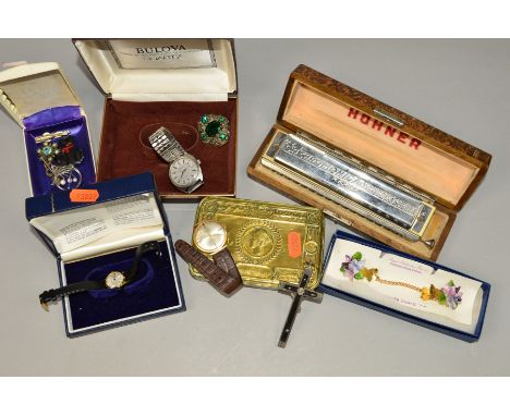 A SELECTION OF ITEMS to include a cased 64 Professional harmonica, a cased gentleman's Bulova quartz watch, a ladies Regency 