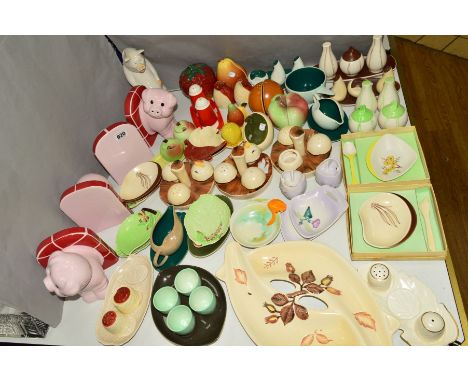 A LARGE GROUP OF CARLTONWARE CRUETS, BOOK ENDS etc, to include two pairs of 'Pig' book ends, a 'Pig' jug, three mushroom shap