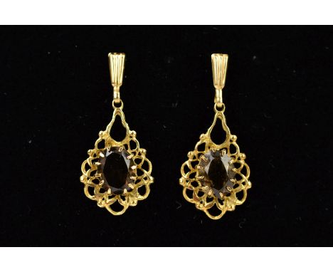 A MODERN PAIR OF 9CT GOLD SMOKEY QUARTZ DROP EARRINGS, filigree open work design, measuring approximately 31mm in length, hal