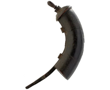 AN 18TH CENTURY INDIAN HORN POWDER FLASK, the black lacquered body carved to either end with bands containing a geometric des