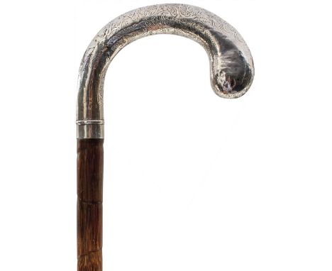 A WALKING STICK WITH SILVER HANDLE, the handle engraved with foliate scrolls and hallmarked Chester 1900, bamboo shaft, metal