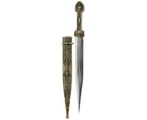 A KINDJAL, 28cm triple fullered blade, characteristic white metal hilt decorated with filigree within a beaded border, contai