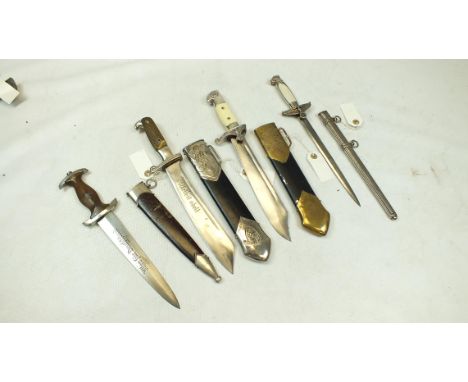 A THIRD REICH SA DAGGER, 22cm flattened diamond section blade with RZM M7/91 mark and etched with the motto Alles Fur Deutsch