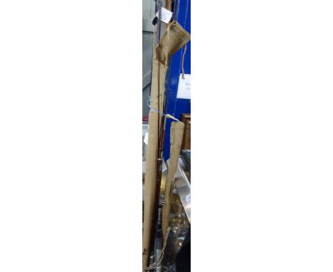 A COLLECTION OF VINTAGE FISHING RODS