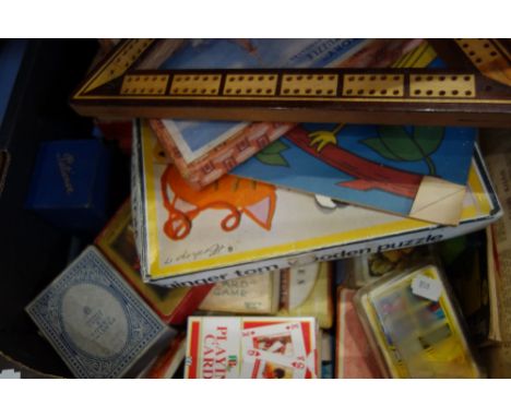 A COLLECTION OF VINTAGE PLAYING CARDS, toys and sundries