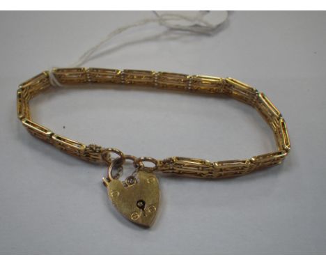 A 9CT GOLD GATE LINK BRACELET, with padlock clasp, approx. 12grams
