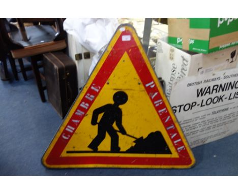 A VINTAGE TRIANGULAR TIN MEN AT WORK SIGN with added stencilled inscription 'Chambre Parentale'