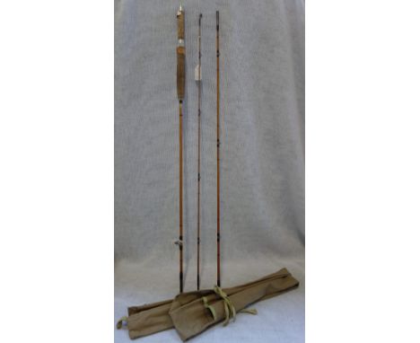 A VINTAGE CANE FISHING ROD, with canvas case