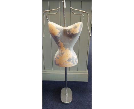 A VINTAGE SHOP 'BUST' DISPLAY STAND, with a chrome stand, the bust with maker's label, 'Pierre Imans Figures &amp; Fashion De